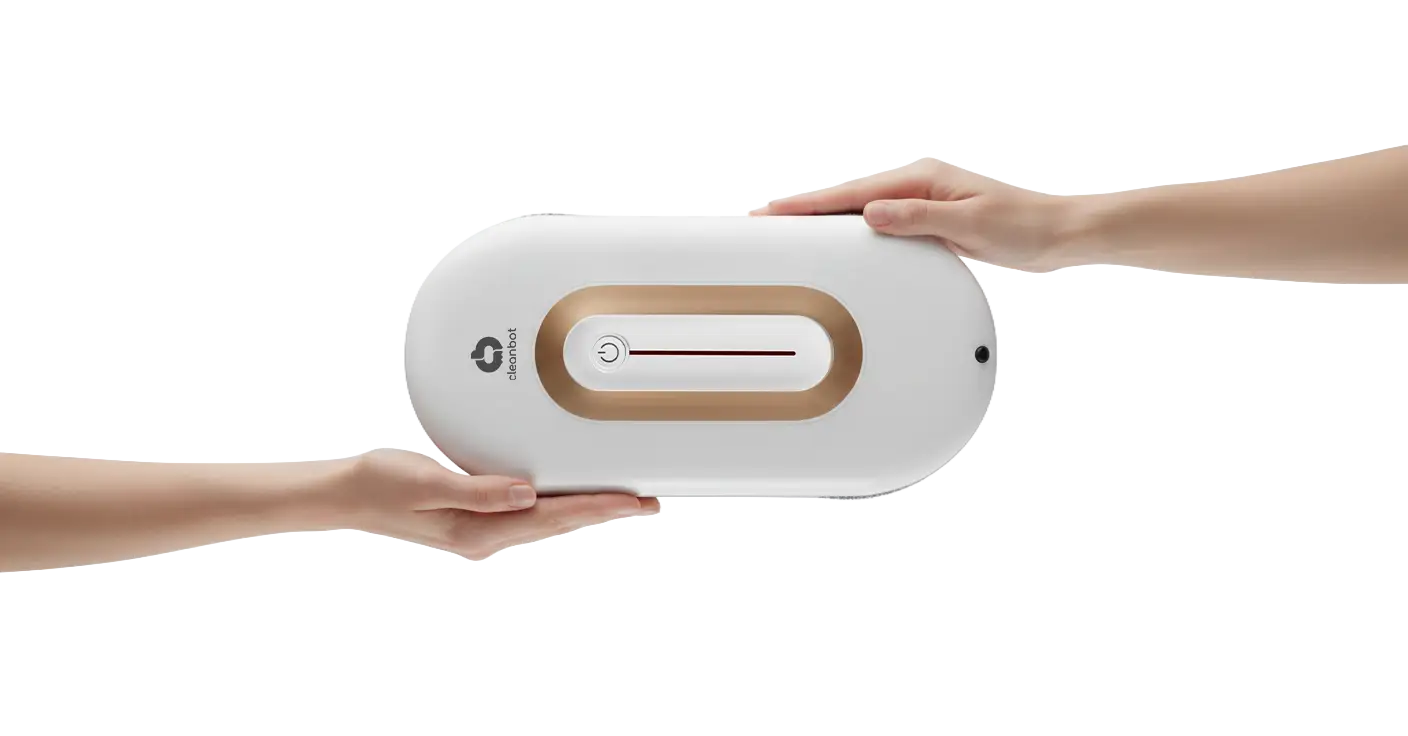 Cleanbot device held in hands